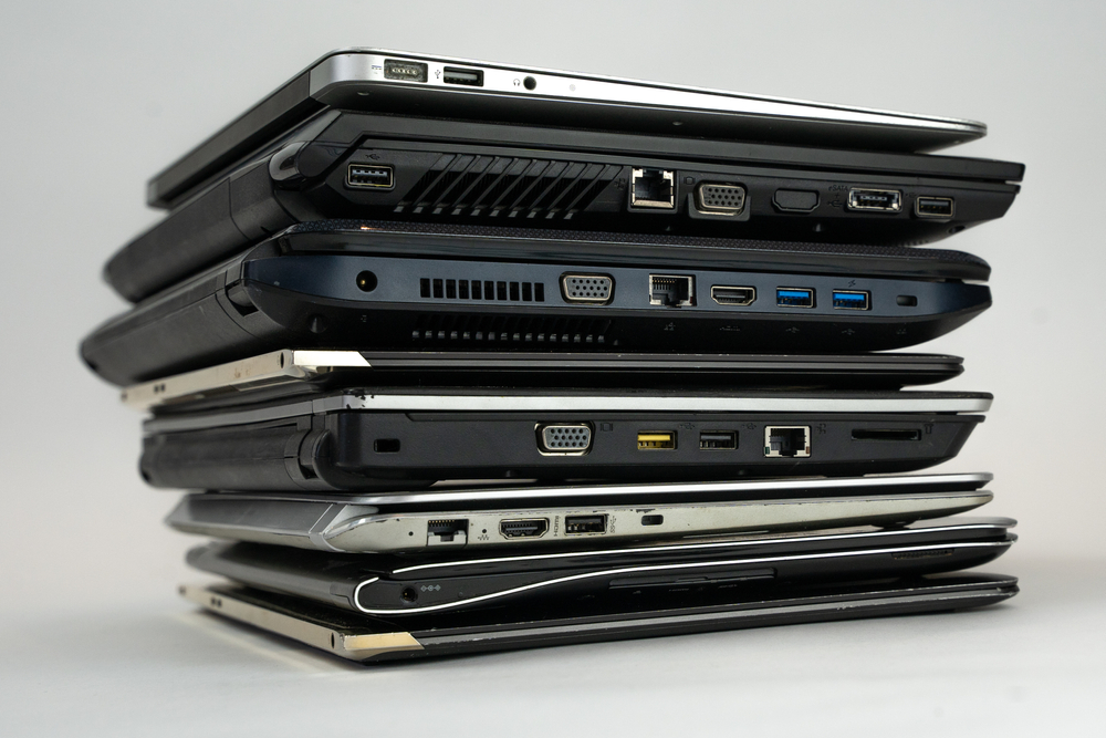 stack of laptops on top of eachother