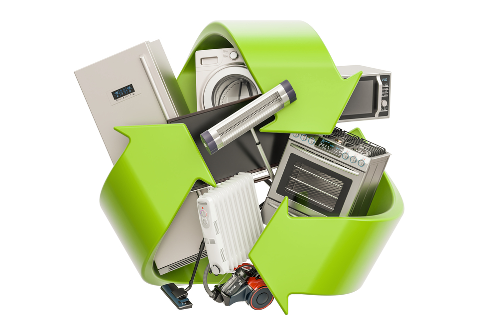 green recycle symbol with household electronics
