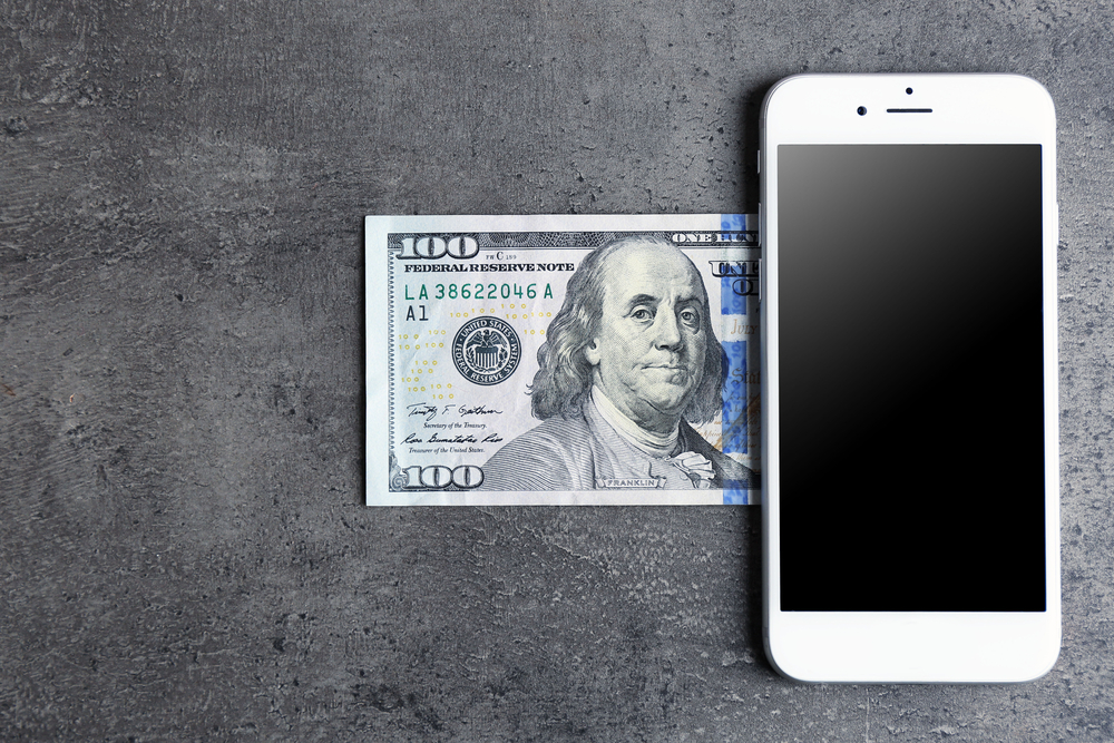 dollar coming out of smartphone